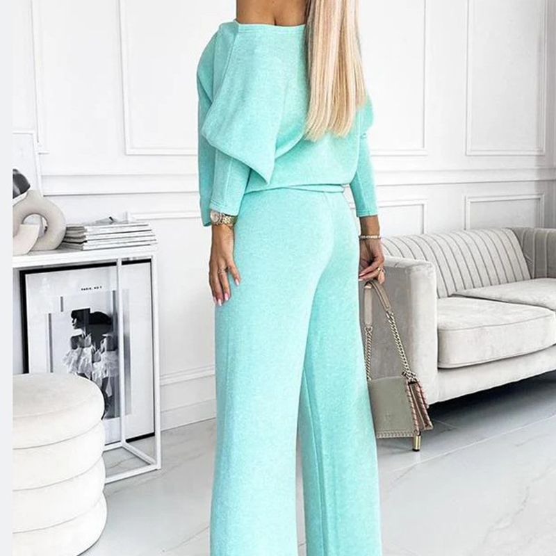 Women's set with solid color Drop Shoulder Pullover and loose pants