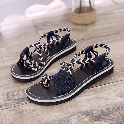 Flat sandals with braided strap for women